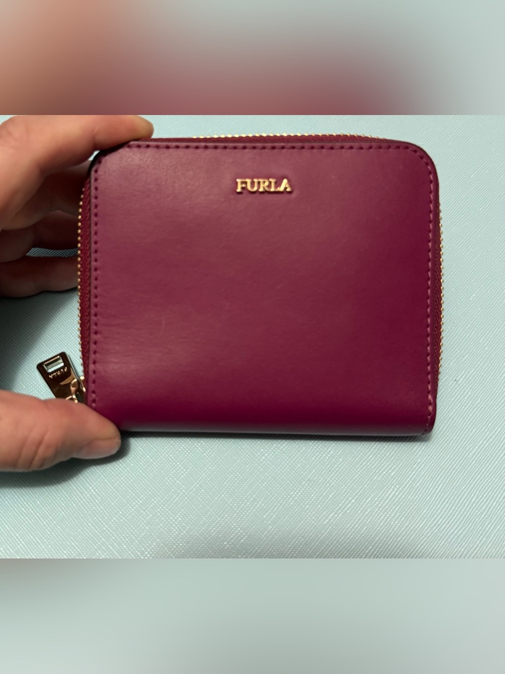 Furla compact zip-around wallet in deep magenta with silver logo